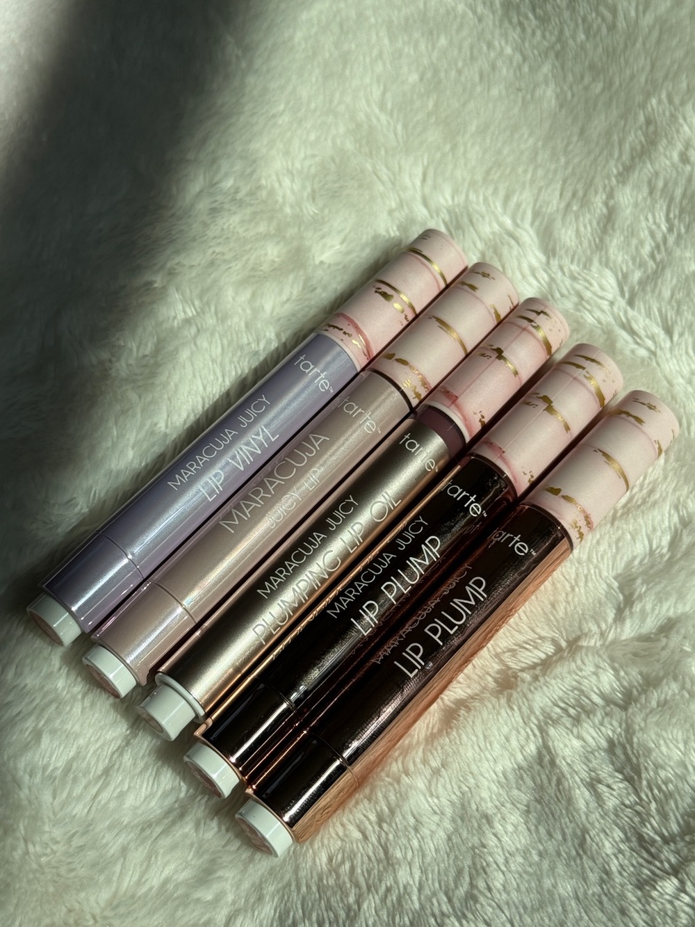 5 limited edition Tarte x Dunkin’ Vanilla Icing Maracuja Juicy Lip products